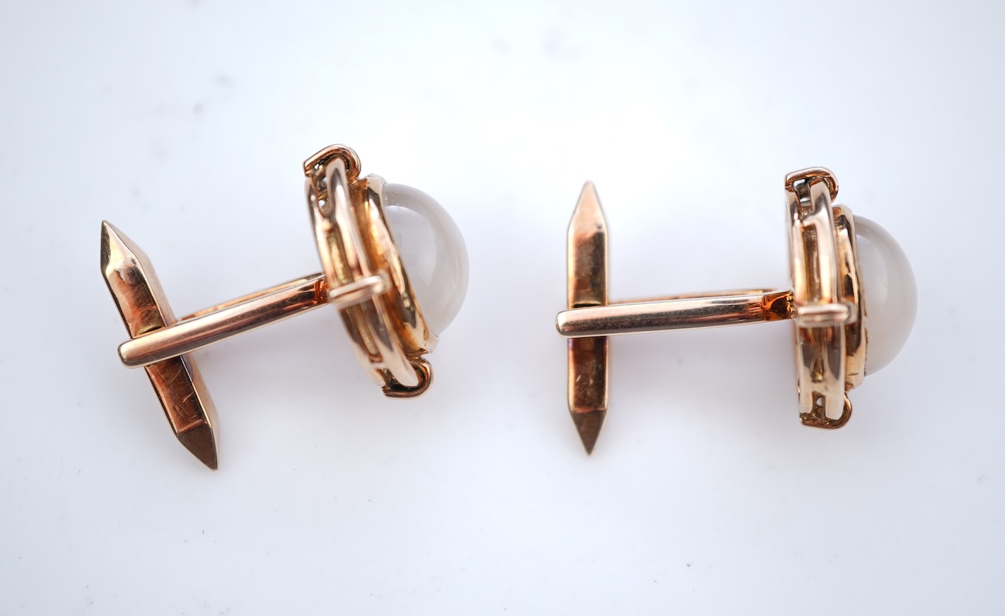 A pair of moonstone cufflinks